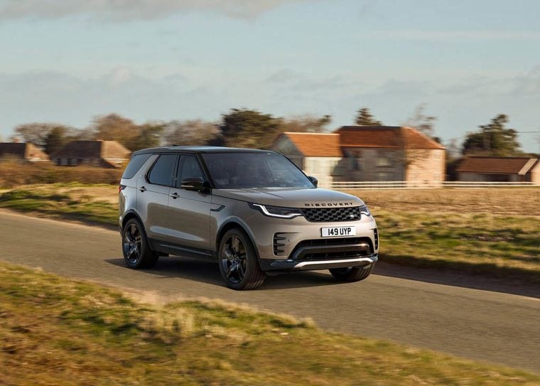 Land Rover Discovery front end driving on the road