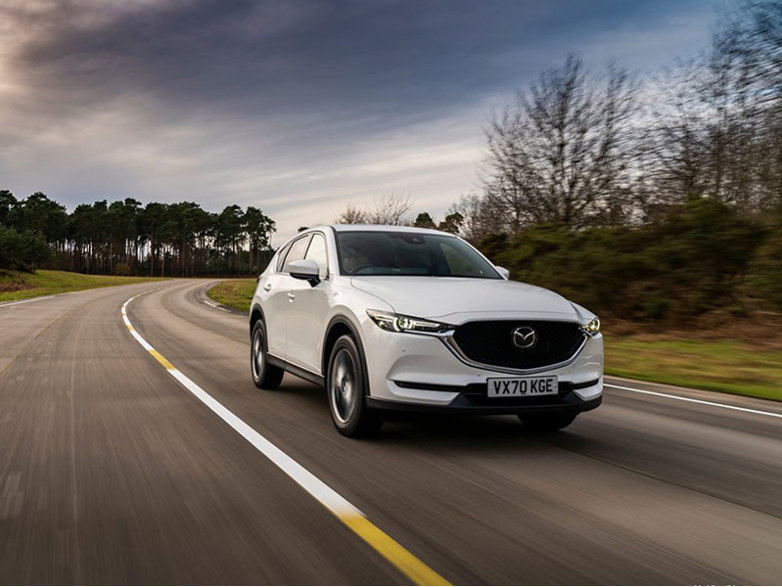 mazda cx-5 driving on road