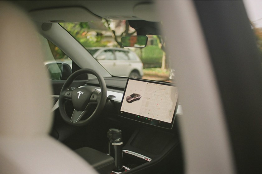 Tesla cabin interior with touchscreen display