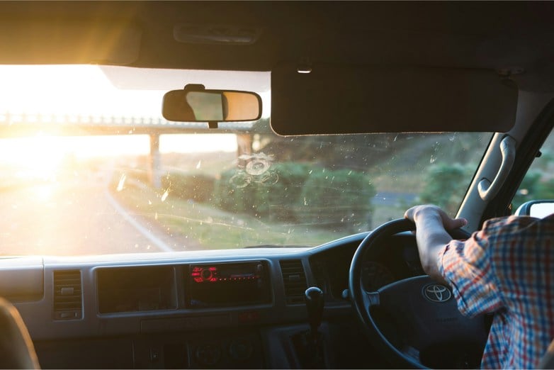 person driving Toyota vehicle