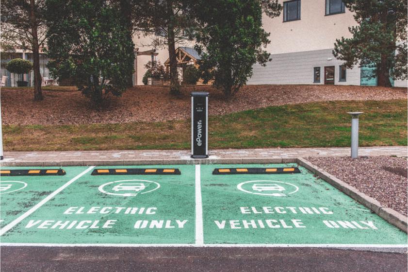 Electric car parking space with charger