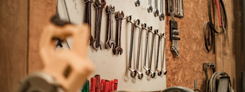 Spanners and tools at a workbench