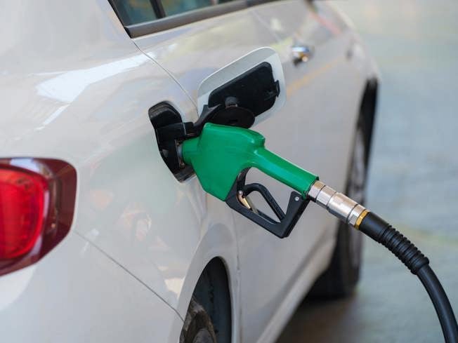 Petrol pump in a white car