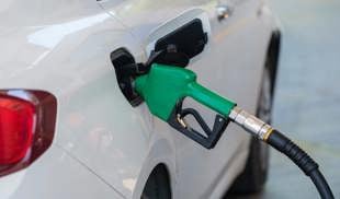 Petrol pump in a white car