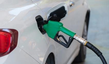 Petrol pump in a white car