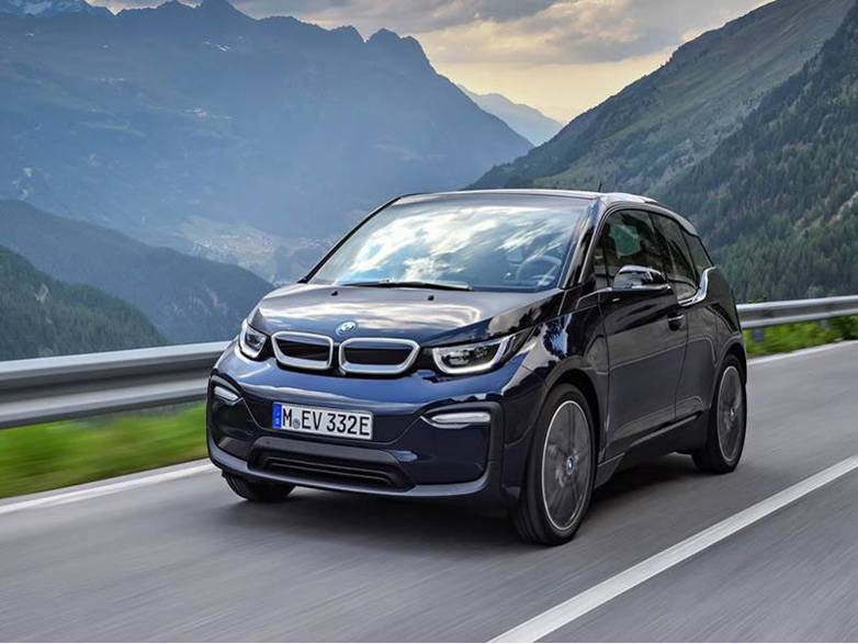 black bmw i3 driving on road