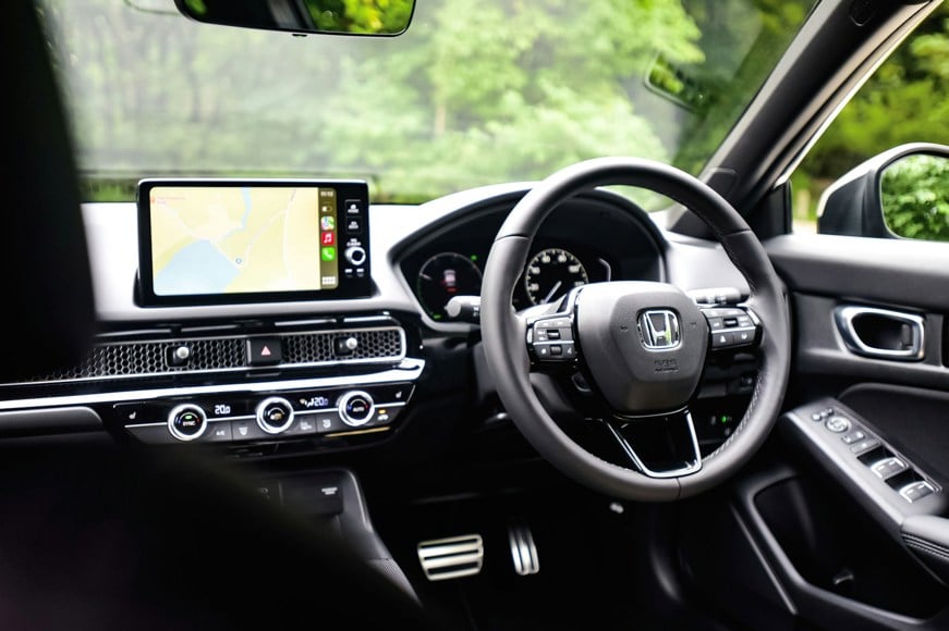 Honda lease car with infotainment system connected to Apple CarPlay