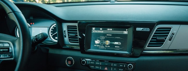 black car stereo turned on during daytime