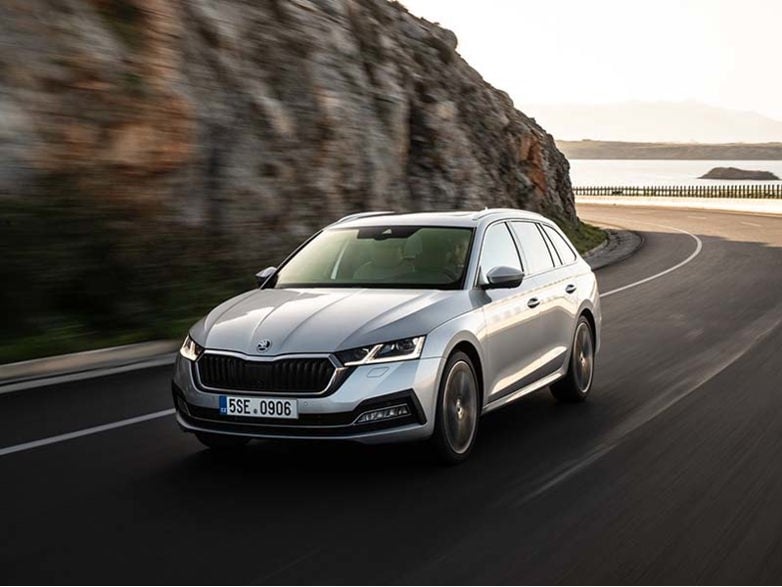 Silver Skoda Octavia Estate on cliff road