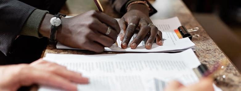 Man signing a contract