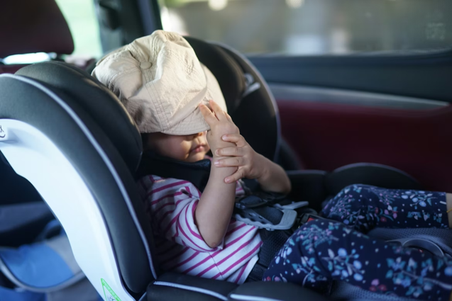child sat in car seat