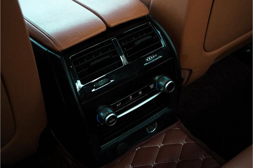 Rear air vents in a car with leather surrounds