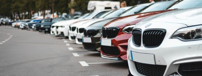 parked cars on road during daytime