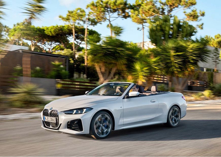 BMW 4 Series Convertible driving on the road