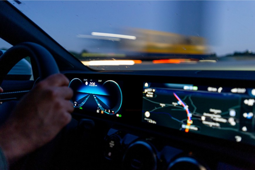 Person driving car and digital cockpit and infotainment display