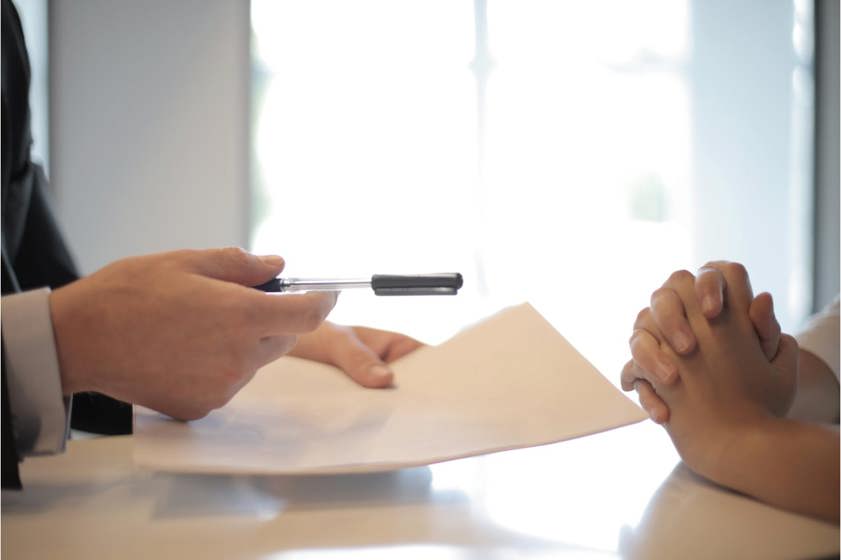 businessman offering customer a contract