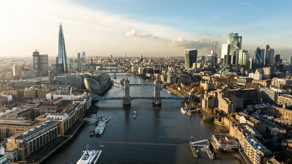 Aerial view of Tower bridge, Business Center and City of London on a sunny day