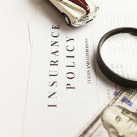 A magnifying glass sitting on a piece of paper