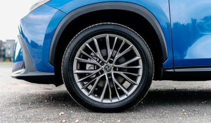 Blue car with silver alloy wheels