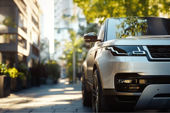 Luxury SUV Parked in a Modern Urban Setting with Stylish Details