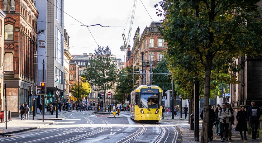 Princess street in Manchester with tram on the road