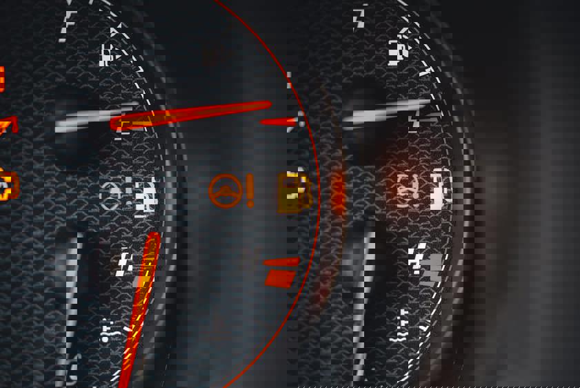 A car dashboard warning light