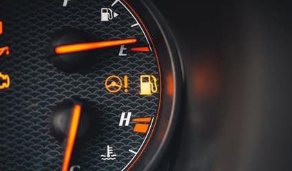 A car dashboard warning light