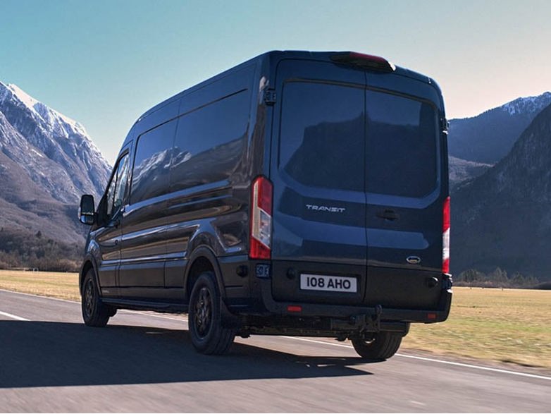 ford transit driving on the road