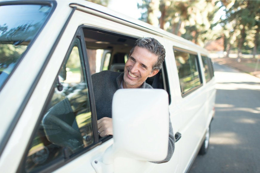 Man driving white van