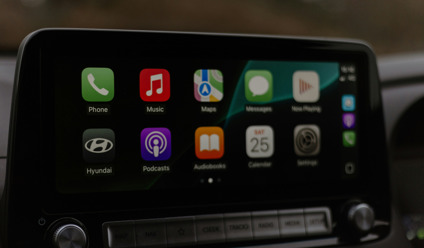 Close-up of a Hyundai car infotainment screen featuring Apple CarPlay interface