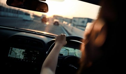 woman driving on the road