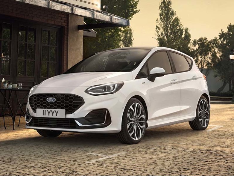 Ford Fiesta parked outside a café at dusk