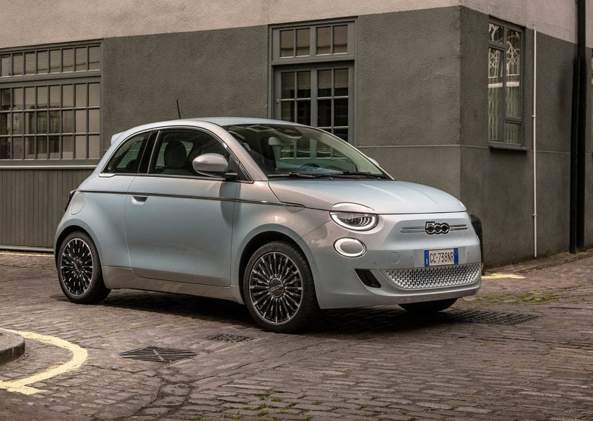 Fiat 500 driving on road