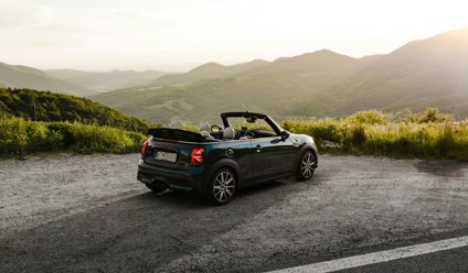black convertible car on road during daytime