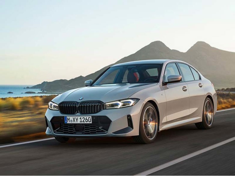 BMW 3 Series on a coastal road