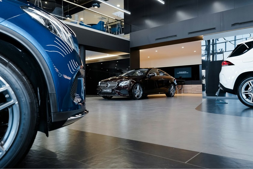 Black Mercedes-Benz car in a showroom