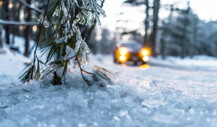 car on snow during daytime