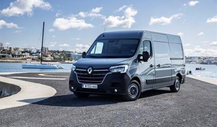 A photo of a Renault Master van parked on a road, with the Renault logo visible.