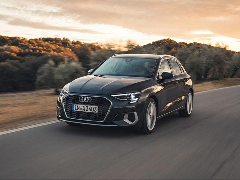 black audi a3 sportback driving on road