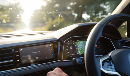 Driver’s view of a Volkswagen dashboard with digital displays and Air Conditioning System