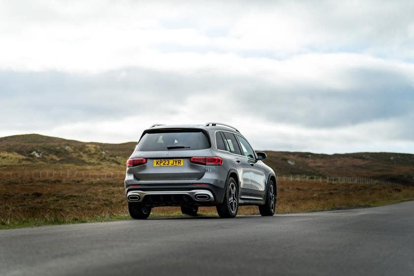 Mercedes-Benz SUV in silver driving in the countryside