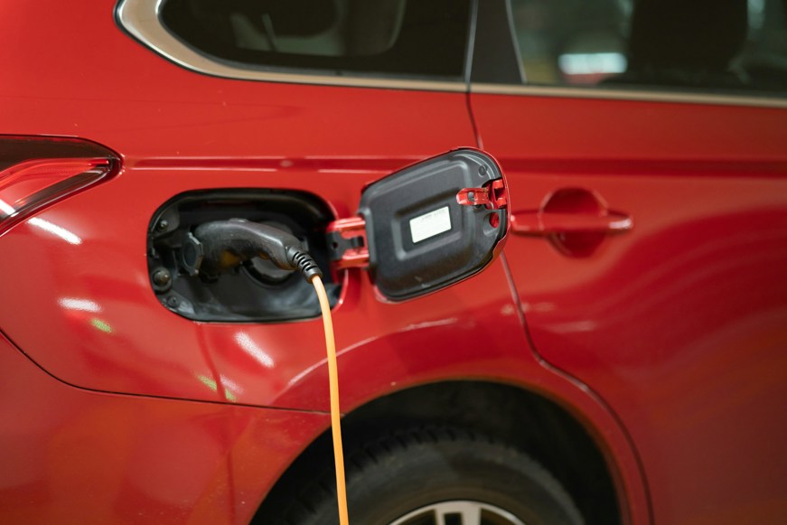 red electric car charging