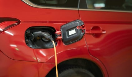 red electric car charging