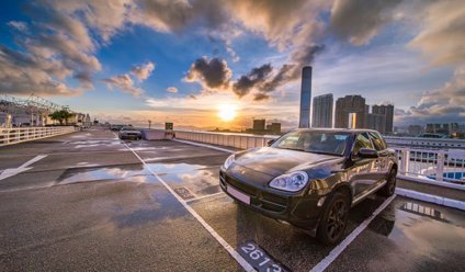 Image of a car parked in a parking space. 