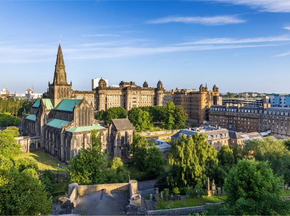 Glasgow Cathedral, the oldest cathedral on mainland Scotland, and the Old Royal Infirmary shot from the Necropolis Victorian Cemetery