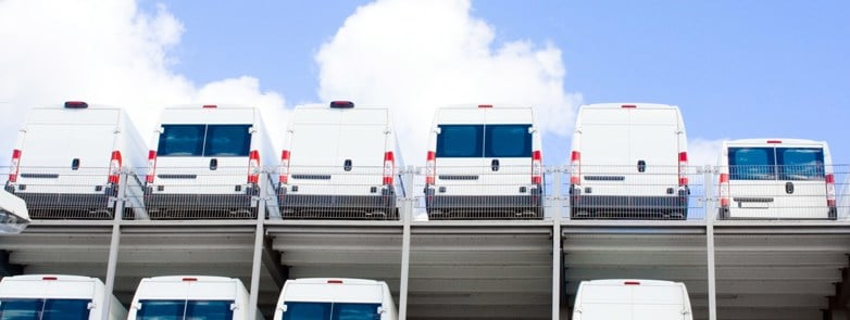 white vans parked in a row