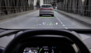 Speed and road data projected onto the windscreen of an Audi car